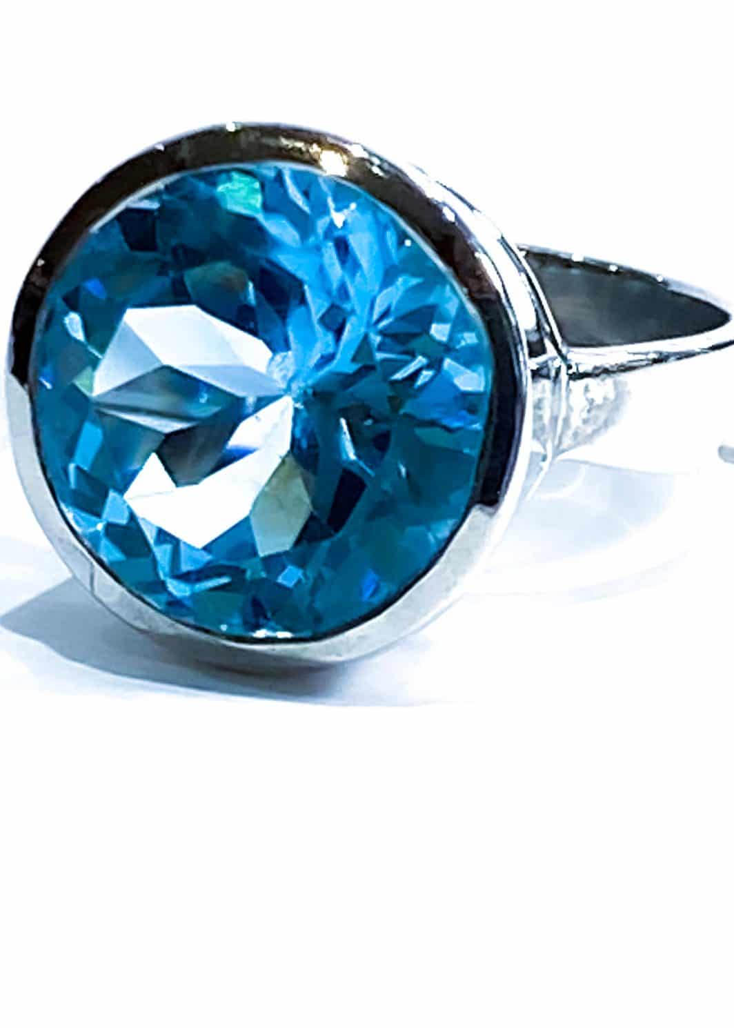 Silver Lady's Ring With Topaz Round